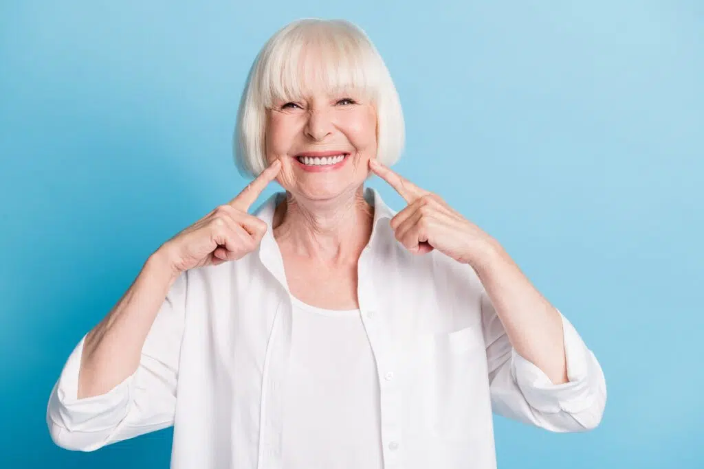 Blonde woman smiling with veneers